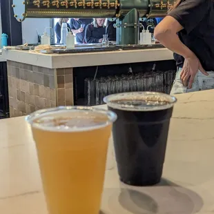 two beers on a bar