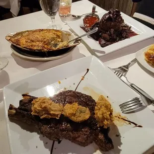 20 oz bone in ribeye topped with fried oysters