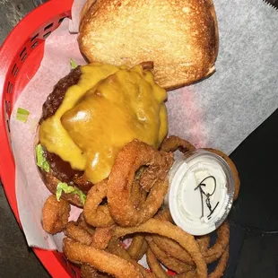 a cheeseburger and onion rings