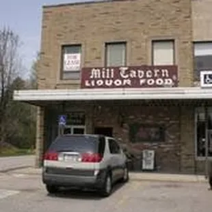 a car parked in front of the building