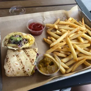 Breakfast burrito with gf wrap and fries. That salsa was amazing!!
