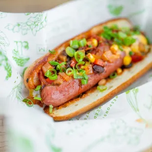 a hot dog in a basket