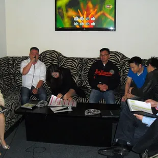 a group of people sitting on a couch