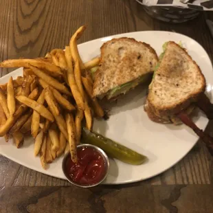 Grilled chicken with avocado and fries