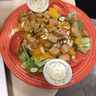 Polynesian Salad, full size. Marinated chicken, mandarin oranges, almonds, tomato, and sweet basil dressing