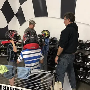 John (the owner) helping my family out finding their right helmet sizes