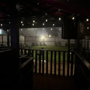 Back patio with corn hole