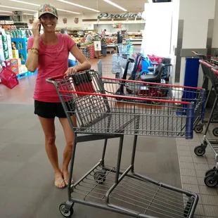 Super tall shopping carts. Person in pic is 5'7" for reference