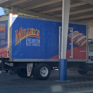 a delivery truck parked in a parking lot