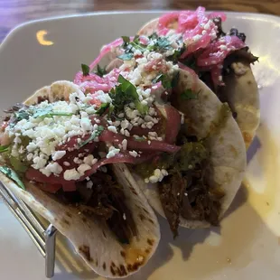 Meager, overly wet tacos