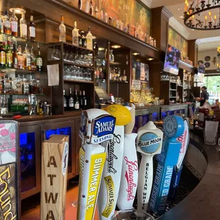 a row of beer taps