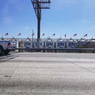 a silver truck parked on the side of the road