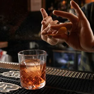 a bartender making a drink