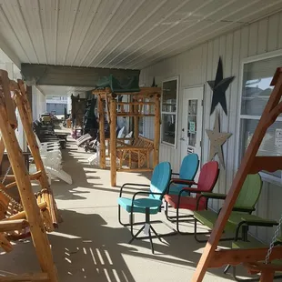a porch with swings