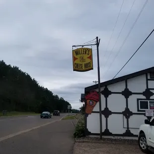 a sign for miller's cheese house