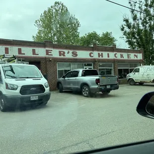 trucks parked in front of a building