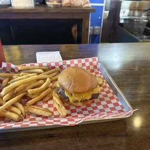 a cheeseburger and fries