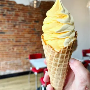 Mango sherbet twisted with vanilla ice cream