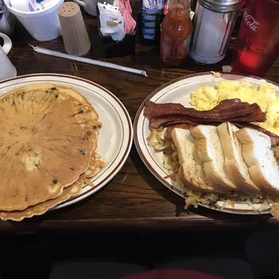 Chocolate chip pancakes w/ eggs bacon toast &amp; hashbrowns