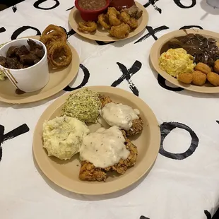 three plates of food on a table