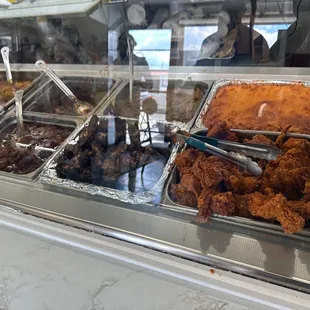 Fried chicken, curry goat, jerk chicken, stew beef