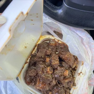 Oxtail over rice peas express plate ! Yum