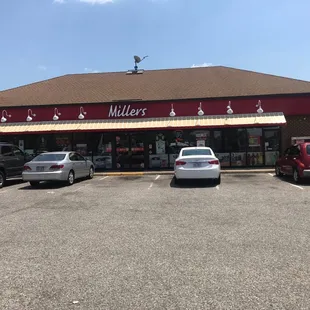 cars parked in front of the store