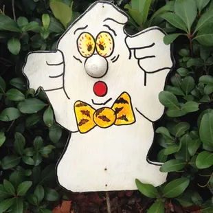 a ghost with a bow tie