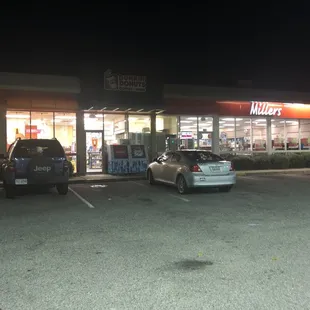 a car parked in front of the store