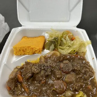 Beef stew over a bed of rice with cabbage and cornbread ONLY $7!!!
