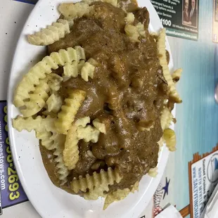 Open face beef sandwich with fries and beef gravy
