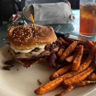 Bogey Burger and Sweet Potato Fries. Delicious. Chicken Caesar Salad was alright