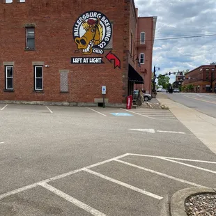 Outside in the parking lot.