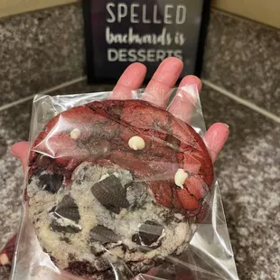 Gemini Cookie is a half red velvet cookie mashed up against a Oreo cheesecake cookie
