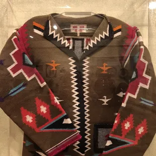 A child's jacket .. beautiful ... gorgeous display.