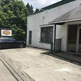 a car parked in front of a building