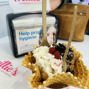 One scoop of Dulce De Leche ice cream and one scoop of Marsh Mallow Brownie ice! We shared it!