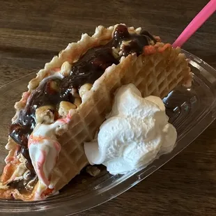a piece of pie with whipped cream