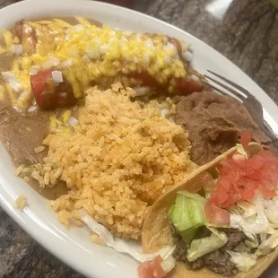 Enchiladas beans rice and taco