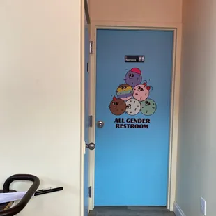 a blue door with a cartoon character on it