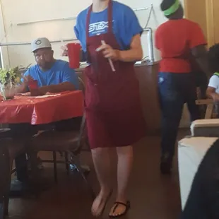 Waitress in flip flops and daisy dukes. Can they wear black tops and black appropriate bottoms?