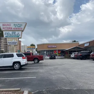 The plaza parking lot, so you don&apos;t miss it driving by!