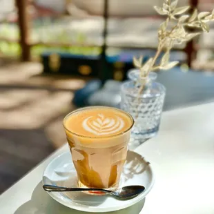 Vanilla latte W/add shot.  Housemade vanilla syrup