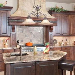 a large kitchen with a center island