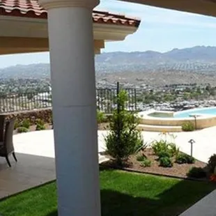 a patio with a view of the mountains