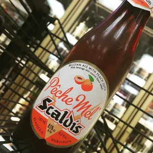 a bottle of peach ale