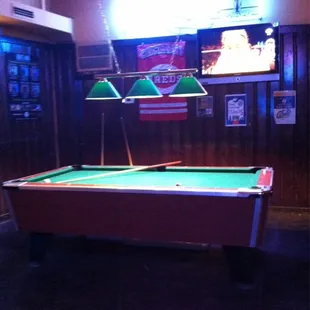 a pool table in a restaurant