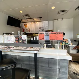 inside front of cash register and booth seating