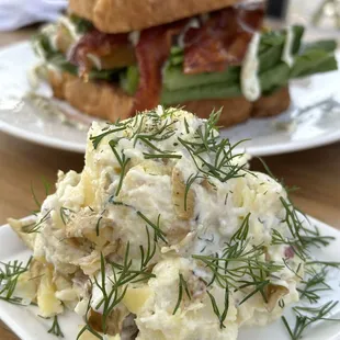 Potato salad being photo bombed by my Heirloom Tomato Sandwich, but the fresh dill added the perfect flavor to a great side