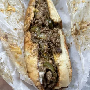 Philly cheesesteak w no lettuce tomatoes + jalapeños &amp; extra cheese